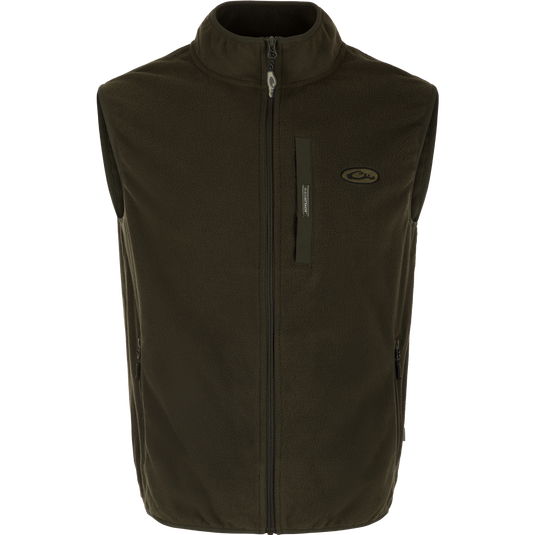 A close-up of the Camp Fleece Vest, a black outerwear with a zipper. Perfect for layering under Drake outerwear or for any Spring or Fall outfit.
