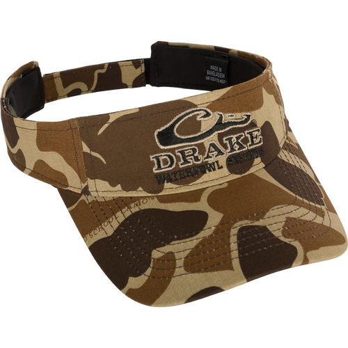 Drake Logo Visor with camouflage pattern and embroidered Purewhitelaneshop Systems logo on the front. Velcro back closure. Made of 100% cotton (solid colors) and 100% polyester (camo colors). Lightly structured front panels. One size fits most.