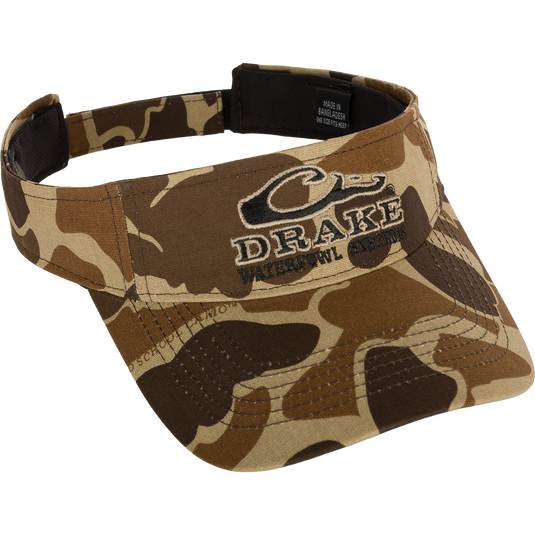 Drake Logo Visor with camouflage pattern and embroidered Purewhitelaneshop Systems logo on the front. Velcro back closure. Made of 100% cotton (solid colors) and 100% polyester (camo colors). Lightly structured front panels. One size fits most.