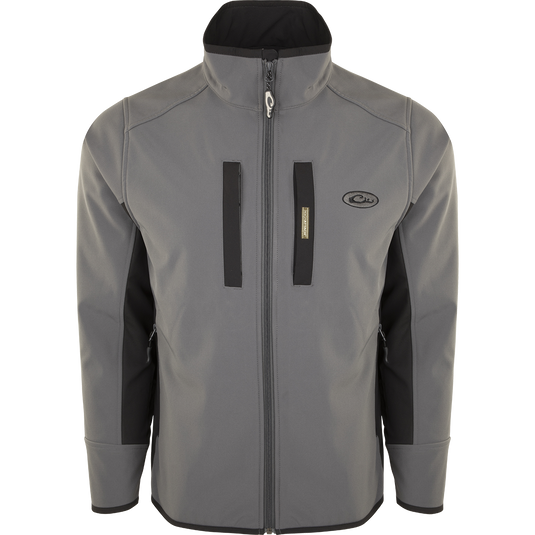 A Windproof Tech Jacket with a stylish two-tone design, perfect for cool Fall days and nights. Features include vertical and chest pockets with zipper closures, side stretch panels, and a drawstring waist. Made with a windproof laminate and check fleece backing.