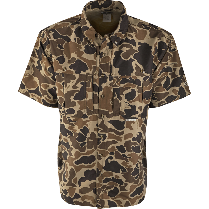 Camouflage Wingshooter's Short Sleeve Shirt with vents, mesh lining, and multiple pockets designed for breathability and functionality during hunting or shooting activities.