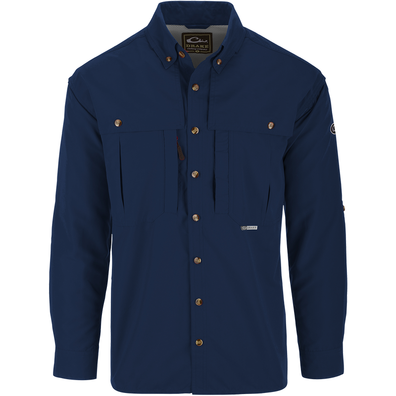 Solid Wingshooter's Shirt L/S with button closure, oversized chest pockets, zippered and Magnattach™ pockets, and sun-blocking extension collar, designed for functional outdoor use.