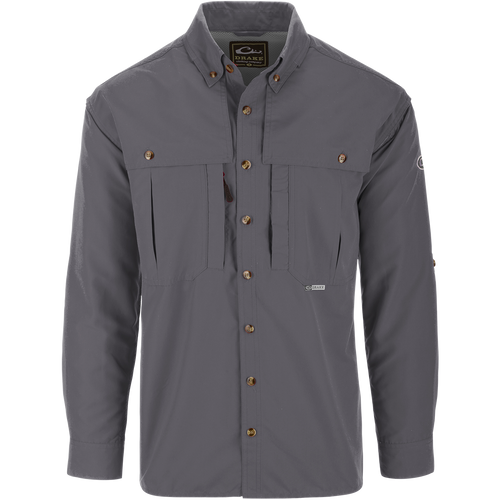 Solid Wingshooter's Shirt L/S featuring a classic seven-button design, oversized chest pockets, and a sun-blocker extension collar.
