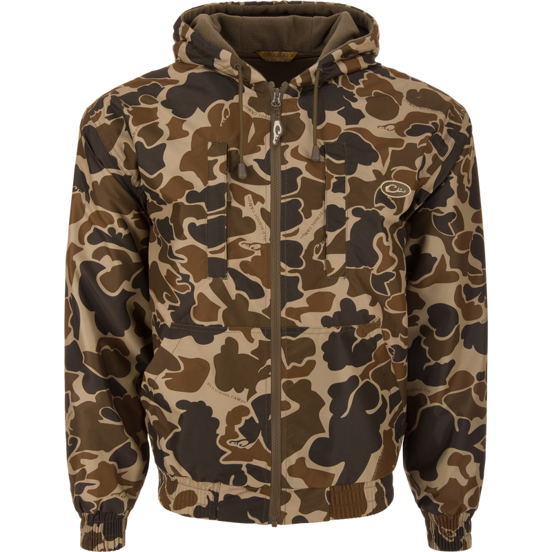 MST Waterproof Full Zip Jacket w/ Hood features a camo pattern, chest and kangaroo pockets, elastic cuffs, and a drawstring hood, ideal for hunting.