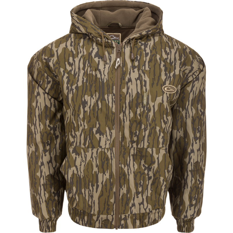 MST Waterproof Full Zip Jacket w/ Hood featuring camouflage design, zipper detail, elastic cuffs, and drawstring hood for hunting in various conditions.