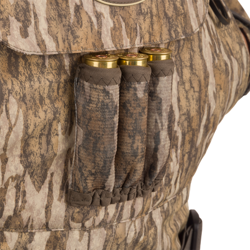 Close-up of Women’s Insulated Guardian Elite Vanguard Breathable Waders, showcasing durable fabric, reinforced seams, internal handwarmer pockets, and front cargo pouch for optimal warmth and functionality.