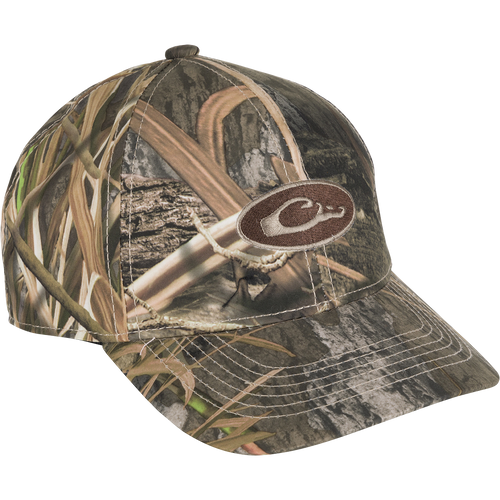 Youth Camo Waterproof Cap with woodland camo pattern, oval C logo patch, and mid-profile six-panel design, offering waterproof, breathable protection for outdoor activities.