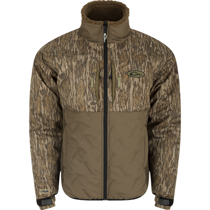 LST Guardian Flex Double Down Eqwader Full Zip Jacket shows durable design with sherpa-lined collar, chest zip-pockets, quilted camo/olive-brown body, and adjustable cuffs.