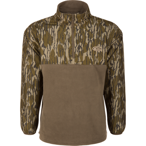 MST Quarter Zip Refuge Eqwader Jacket on a mannequin, featuring a camouflage upper, solid fleece lower, stand-up collar, and small chest logo, ideal for waterfowl hunting.