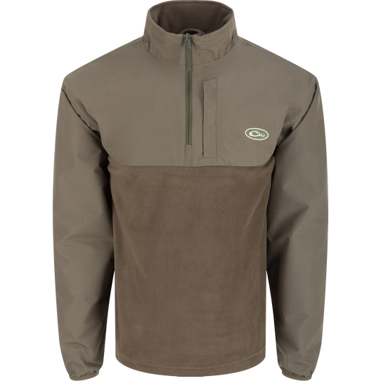 MST Quarter Zip Refuge Eqwader Jacket showcasing waterproof upper fabric and breathable lower material, featuring a collar and sleeve details, ideal for waterfowl hunting.