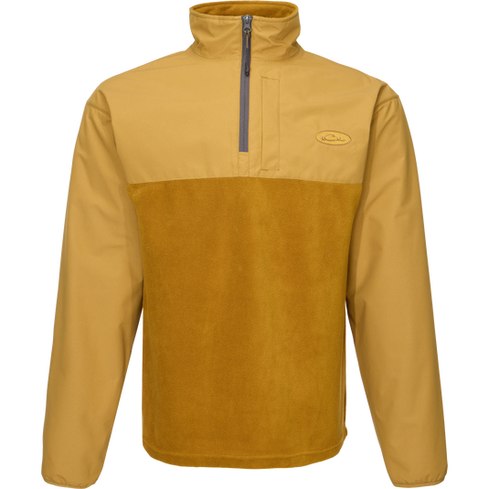 MST Quarter Zip Refuge Eqwader Jacket featuring a close-up of its innovative zipper, logo detail, and durable fabric, designed for superior comfort in waterfowl hunting.