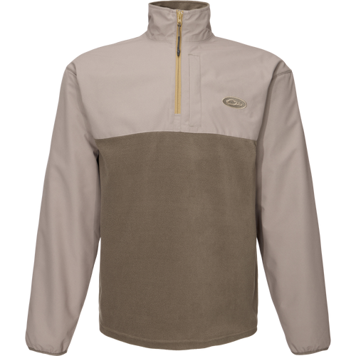 Close-up of the MST Quarter Zip Refuge Eqwader Jacket's zipper, highlighting its innovative waterproof Refuge HS™ fabric and breathable design for enhanced hunting comfort.