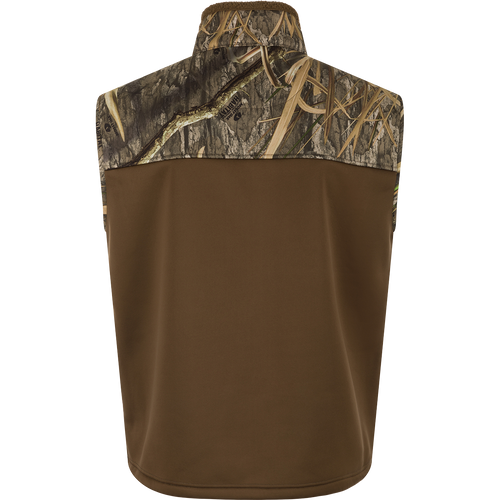 MST Hole Shot Eqwader Vest, windproof with sherpa-lined upper and breathable lower. Features high handwarmer pockets, adjustable waist, and zippered pockets. Ideal for hunting.