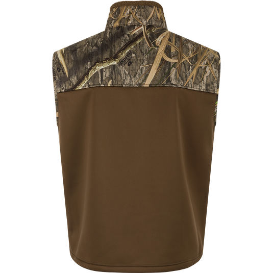 MST Hole Shot Eqwader Vest, windproof with sherpa-lined upper and breathable lower. Features high handwarmer pockets, adjustable waist, and zippered pockets. Ideal for hunting.