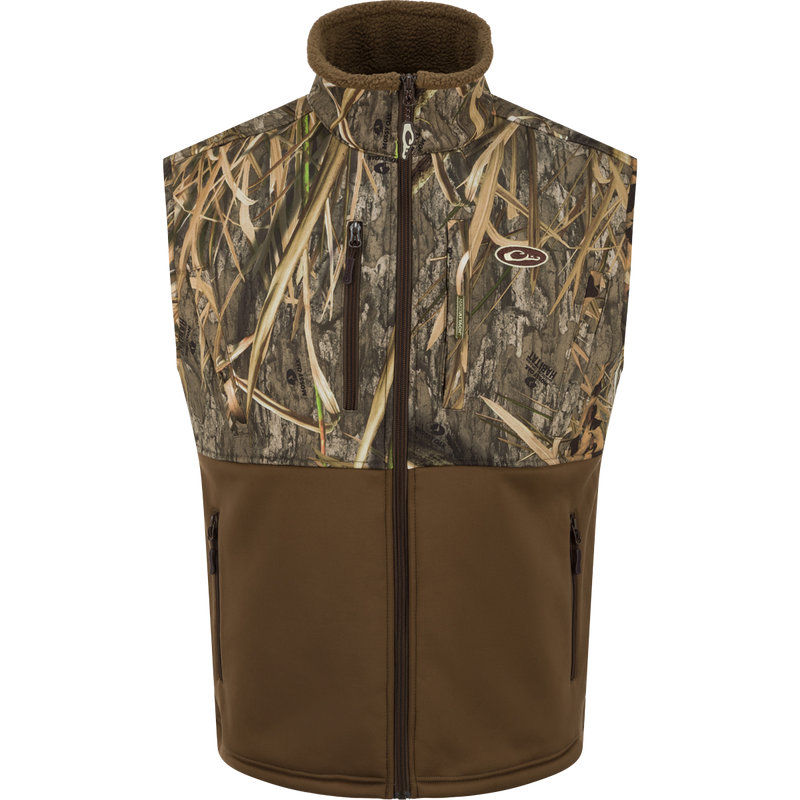 MST Hole Shot Two-Tone Eqwader Vest with windproof upper and sherpa-lined lower, featuring handwarmer pockets and adjustable waist, ideal for mid-to-late season hunting.