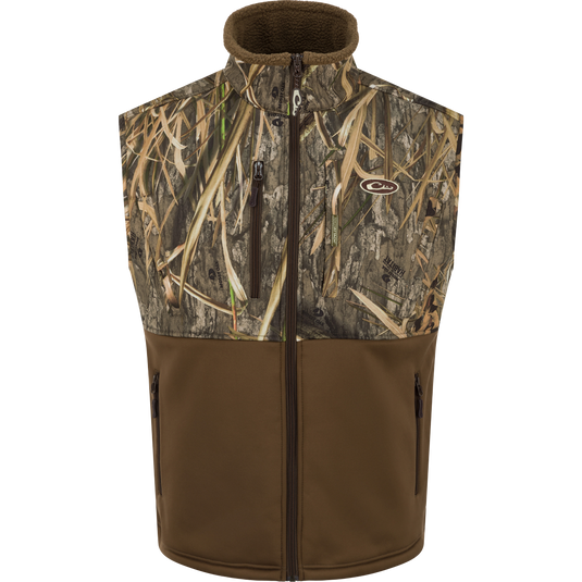 MST Hole Shot Two-Tone Eqwader Vest with windproof upper and sherpa-lined lower, featuring handwarmer pockets and adjustable waist, ideal for mid-to-late season hunting.