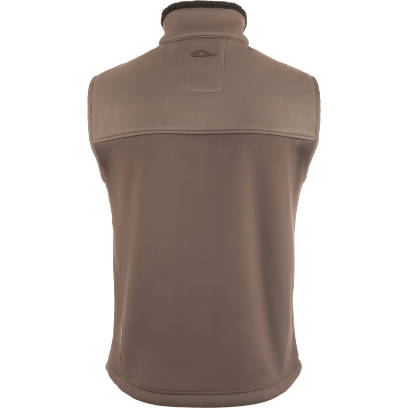 MST Hole Shot Two-Tone Eqwader Vest with windproof upper, sherpa-lined lower, handwarmer pockets, adjustable waist, and zippered pockets, ideal for mid-to-late season hunting.