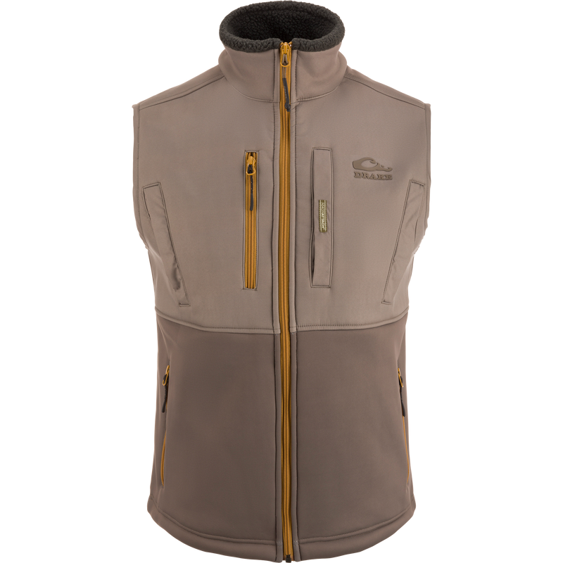 MST Hole Shot Two-Tone Eqwader Vest with windproof upper, sherpa-lined lower, high handwarmer pockets, and adjustable waist, ideal for mid-to-late season hunting.