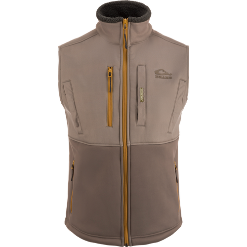 MST Hole Shot Two-Tone Eqwader Vest with windproof upper, sherpa-lined lower, high handwarmer pockets, and adjustable waist, ideal for mid-to-late season hunting.