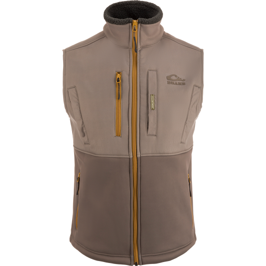 MST Hole Shot Two-Tone Eqwader Vest with windproof upper, sherpa-lined lower, high handwarmer pockets, and adjustable waist, ideal for mid-to-late season hunting.