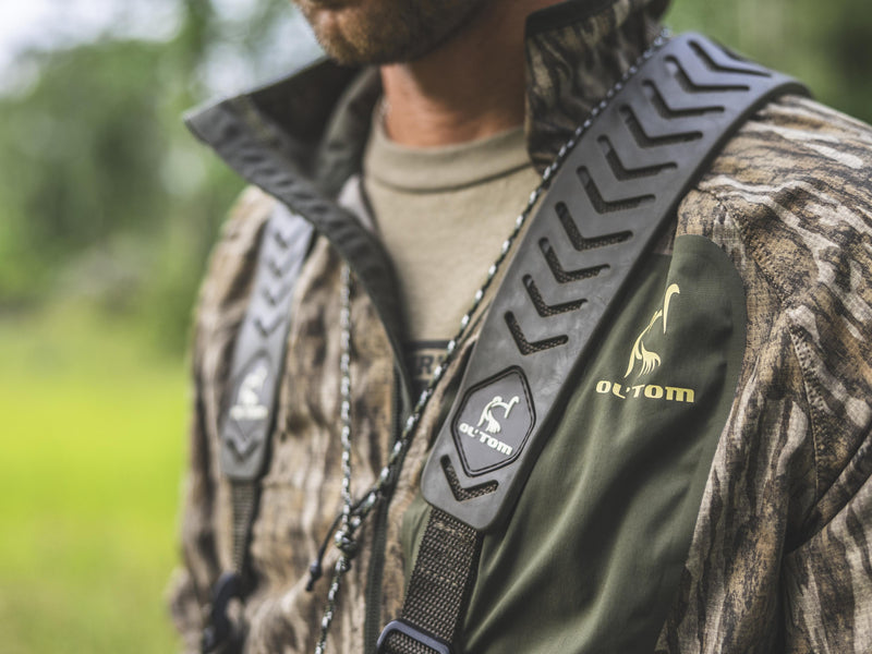 Eqwader Half Zip Pullover featuring camouflage design, ergonomic thumbholes, and a water-resistant chest pocket, ideal for hunting with advanced breathability and antimicrobial control technology.
