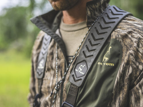 Eqwader Half Zip Pullover featuring camouflage design, ergonomic thumbholes, and a water-resistant chest pocket, ideal for hunting with advanced breathability and antimicrobial control technology.