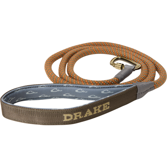 Team Gun Dog Rope Leash featuring a durable patterned cord, metal carabiner, reflective properties, and a padded handle embroidered with “DRAKE” for comfort and safety.