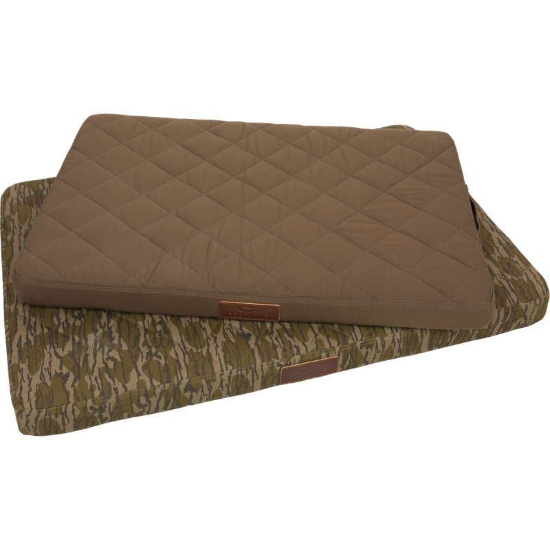 Team Gun Dog Landing Zone Quilted Canvas Dog Bed, featuring olive and camouflage quilted pads, ideal for outdoor-loving pets with durable memory foam and water-resistant cover.