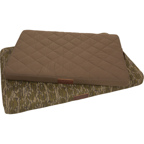 Team Gun Dog Landing Zone Quilted Canvas Dog Bed, featuring olive and camouflage quilted pads, ideal for outdoor-loving pets with durable memory foam and water-resistant cover.