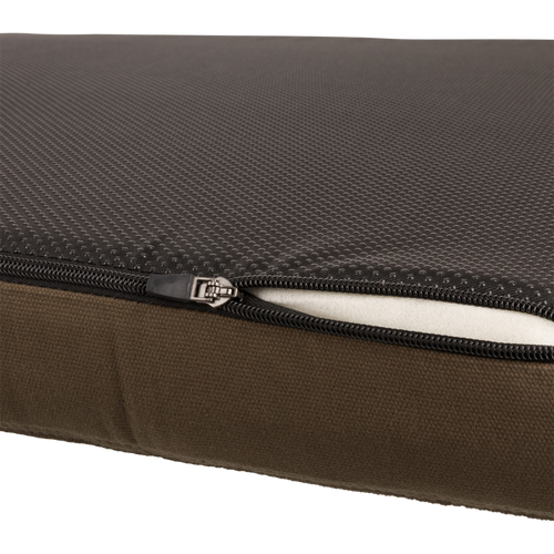 Team Gun Dog Landing Zone Quilted Canvas Dog Bed with non-slip textured black top, partially opened zipper, and visible white memory foam core.