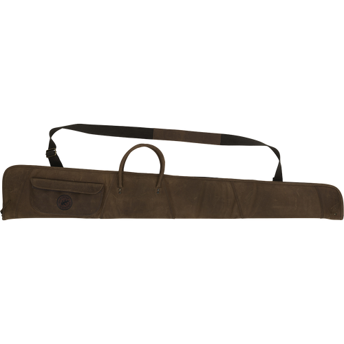 McAlister Leather Shotgun Case: A rugged brown bag with a strap, featuring top grain water buffalo leather, cotton padding, and brass hardware. Includes a choke tube pocket.
