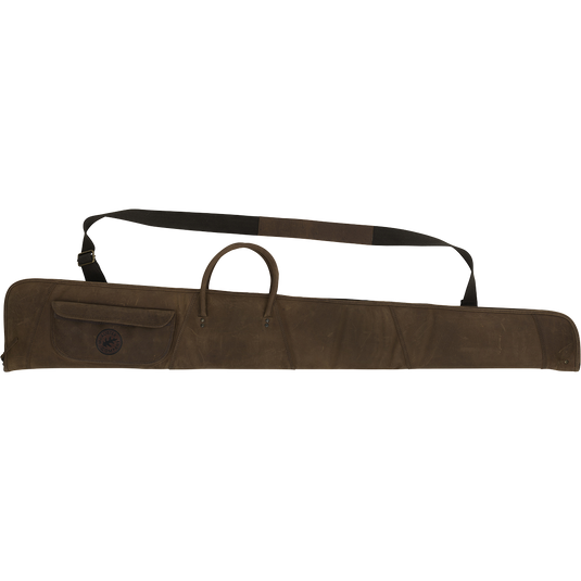 McAlister Leather Shotgun Case: A rugged brown bag with a strap, featuring top grain water buffalo leather, cotton padding, and brass hardware. Includes a choke tube pocket.