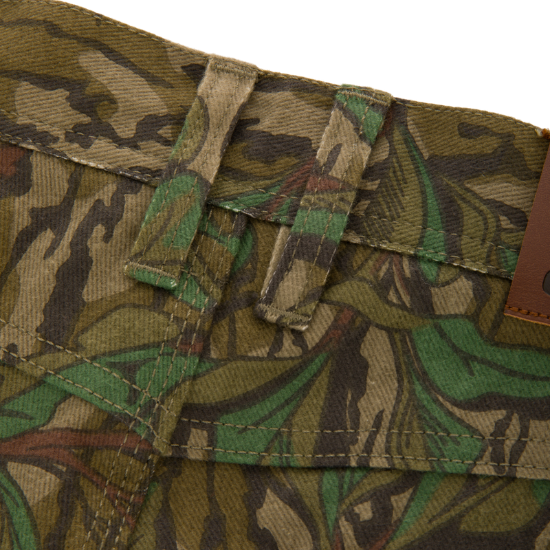 Throwback 80 Field Pant, featuring durable 9.4oz cotton twill, triple stitching, reinforced knees, and antique brass riveted pockets, designed for rugged outdoor activities.