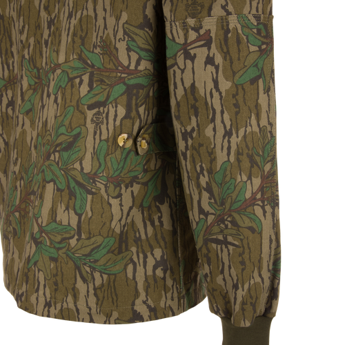 Close-up of the Throwback 80 Field Shirt Jacket, highlighting its durable cotton twill fabric, triple-needle stitching, and antique brass riveted pockets.