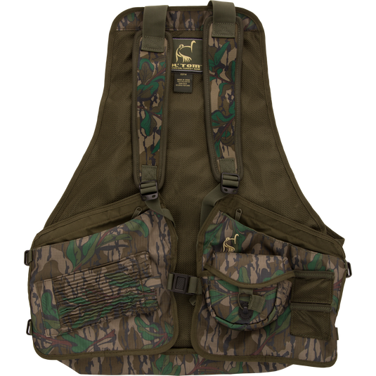 Youth Time and Motion Turkey Vest with camouflage pattern, featuring quick-draw pouches, padded seat cushion, and neoprene straps for enhanced comfort and functionality.