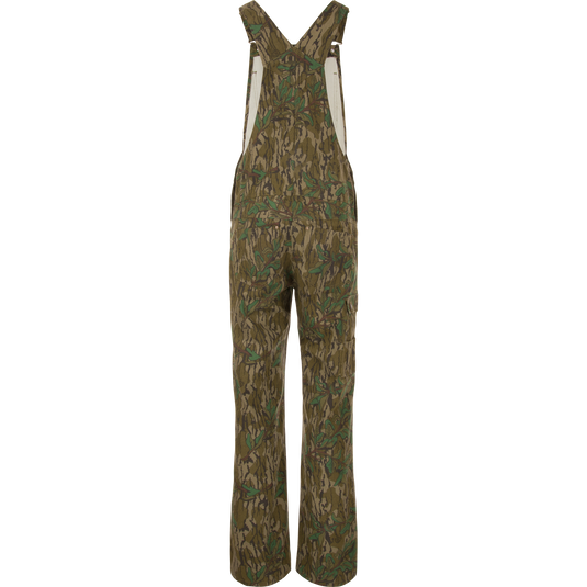 Throwback 80 Field Bib with camouflage pattern, featuring durable triple needle stitching, double-layer knee reinforcement, antique brass riveted pockets, and embroidered logos, ideal for tough tasks.