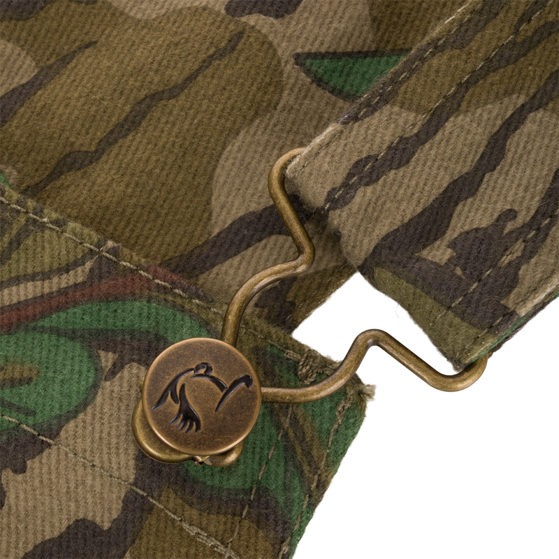 Throwback 80 Field Bib featuring durable cotton twill, antique brass buttons, and triple needle stitching, designed for resilience and practicality in hunting and outdoor tasks.
