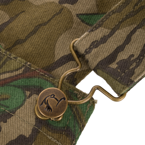 Throwback 80 Field Bib featuring durable cotton twill, antique brass buttons, and triple needle stitching, designed for resilience and practicality in hunting and outdoor tasks.