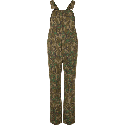 Throwback 80 Field Bib in camouflage, featuring sturdy cotton twill, reinforced knees, and antique brass details, designed for durability in demanding environments.