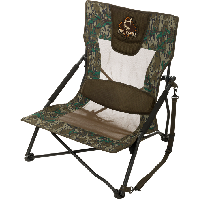 Ultimate Low Profile Turkey Chair: A rugged, foldable OS Green chair with a comfortable sling-style seat and padded lumbar support. Easy to carry with a lightweight shoulder strap. Perfect for turkey hunting.