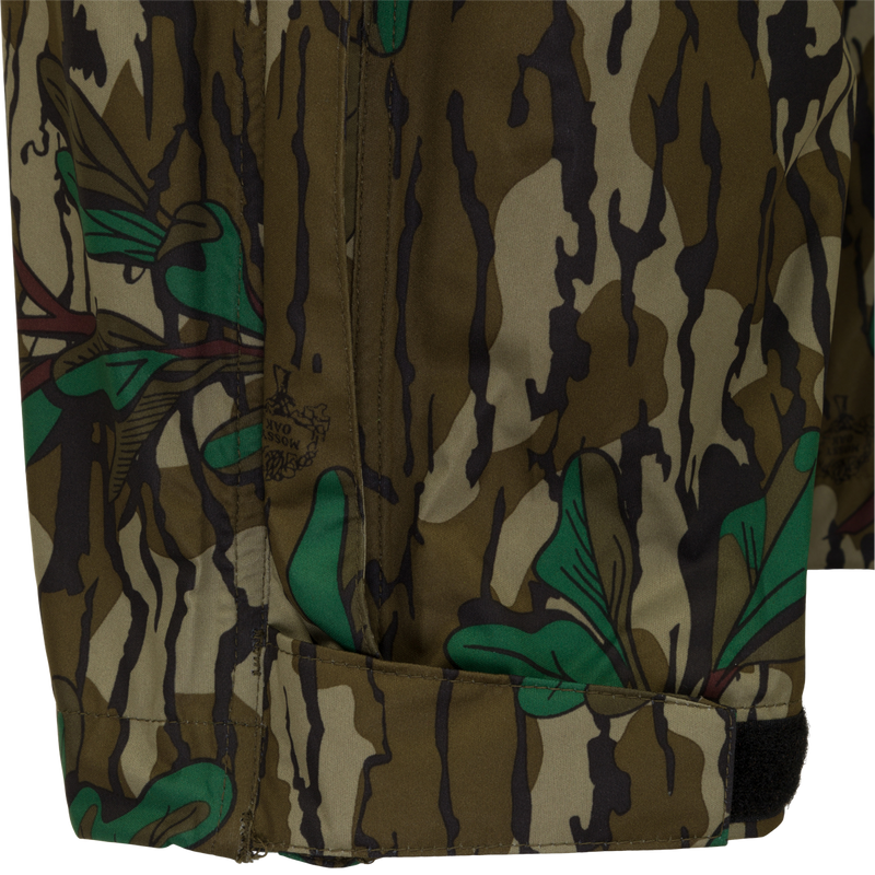 A close-up of the Ultralight Packable Rain Pant, featuring a camouflage pattern fabric. Waterproof, windproof, and breathable, perfect for spring showers during turkey season. Easily packable in a 7