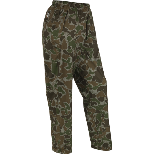 A pair of packable rain pants for outdoor enthusiasts. Waterproof, windproof, and breathable. Perfect for spring showers during turkey season. Easily packable in a 7" X 3" bag. Fits over your original outerwear. From Purewhitelaneshop, your go-to store for high-quality hunting gear and clothing.