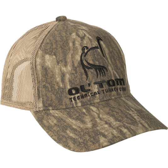 Camo Mesh Back Ol' Tom Logo Cap with a turkey-head logo, mesh back, and Velcro adjustment, ideal for hunting enthusiasts seeking functional, stylish headgear.