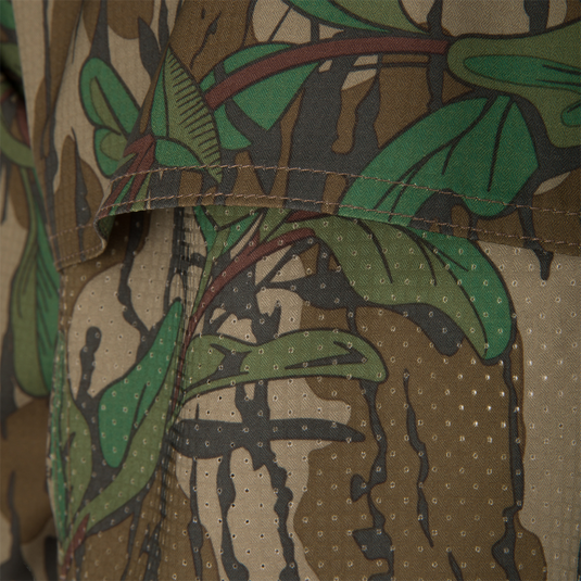 Men's Camo Wingshooter Trey Shirt with camouflage pattern, featuring button-down collar, chest pockets, and vented back for enhanced breathability and performance.