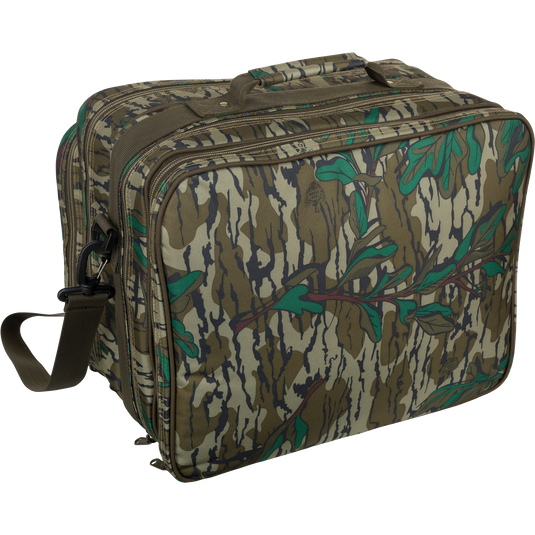 Ol' Tom Treasure Chest camouflage bag with adjustable strap, multiple zippered compartments, and over 90 pockets for organizing turkey hunting calls and tools.