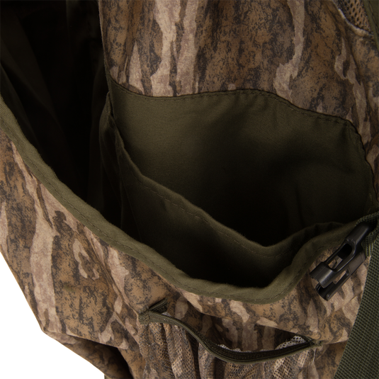 Time & Motion™ Gunslinger Turkey Vest close-up, highlighting durable camouflage fabric, adjustable straps, and organized pockets for hunting gear accessibility.