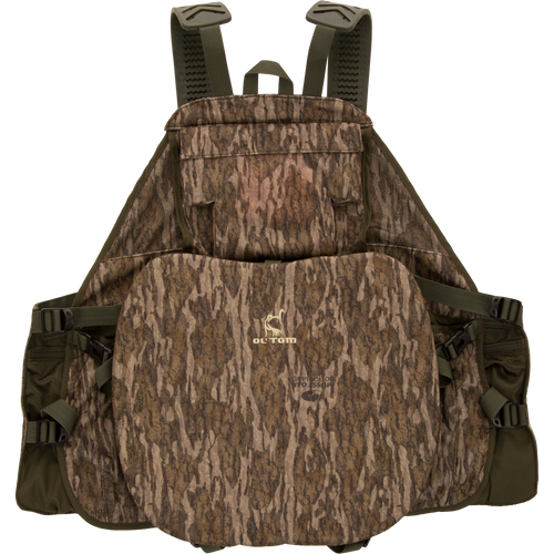 Time & Motion™ Gunslinger Turkey Vest with camouflage design, featuring multiple straps and pockets for hunting gear, and a removable seat cushion for comfort.