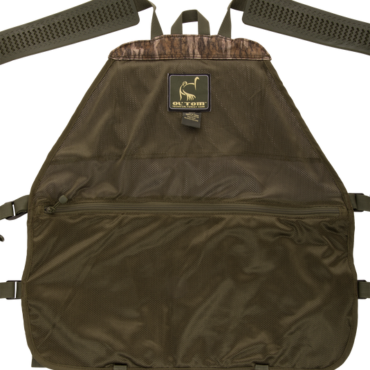 Time & Motion™ Gunslinger Turkey Vest, featuring adjustable straps and organized pockets for hunting essentials, with a visible logo close-up in the image.