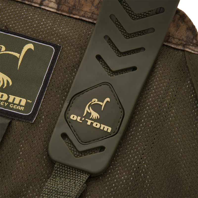 Time & Motion™ Gunslinger Turkey Vest showcasing close-up of adjustable rubber shoulder straps, woven fabric, and multiple organized pockets for efficient gear access.