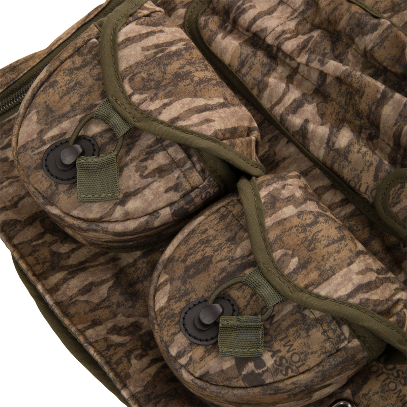 Time & Motion™ Gunslinger Turkey Vest close-up, highlighting its well-organized straps and pockets designed for efficient access to hunting gear and calls.